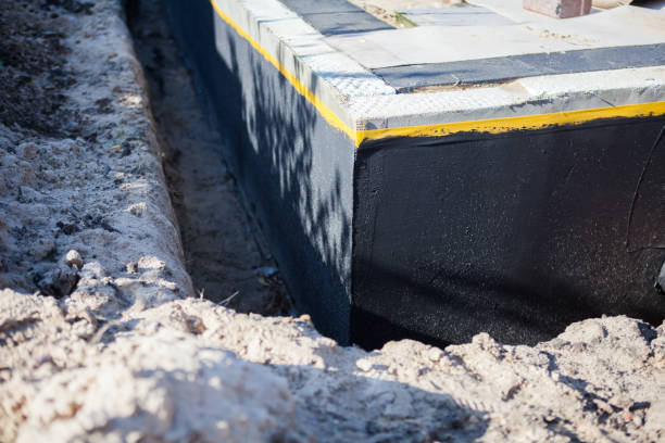 Professional Waterproofing technician working in Erlanger, KY